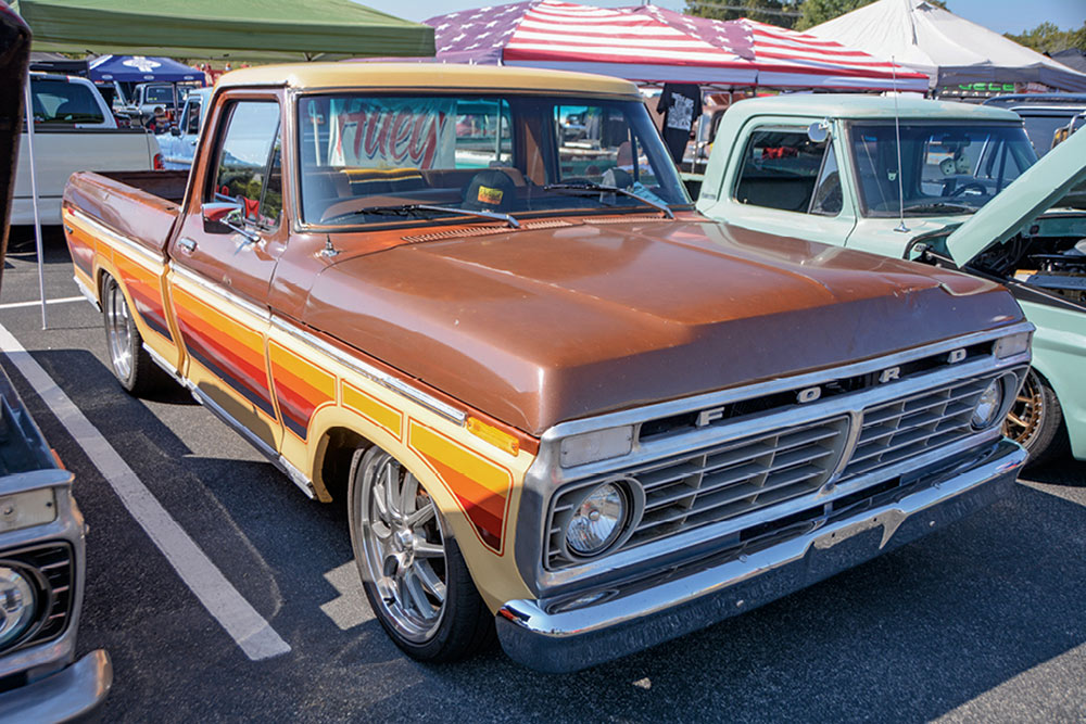 Early 6th gen F-100 in brown with orange decals