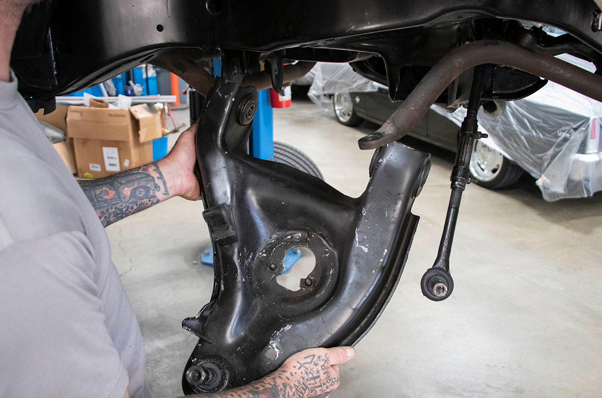 Removing the stock lower control arms is now simply a matter of taking out two bolts on each side.