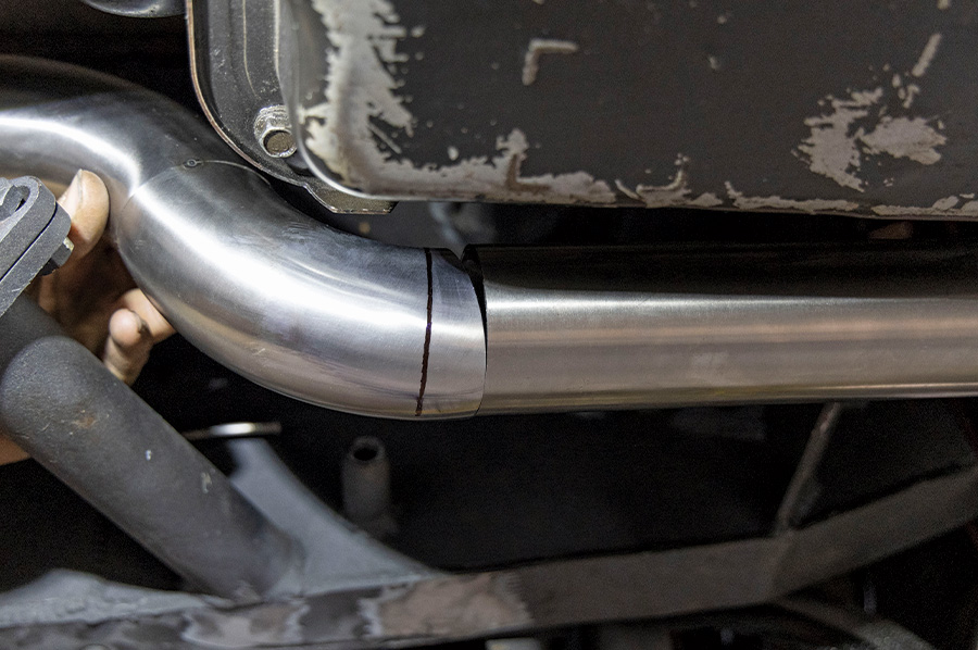 closeup of bend on exhaust pipe of '48 Chevy