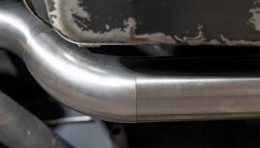 closeup of bend on '48 Chevy exhaust pipe