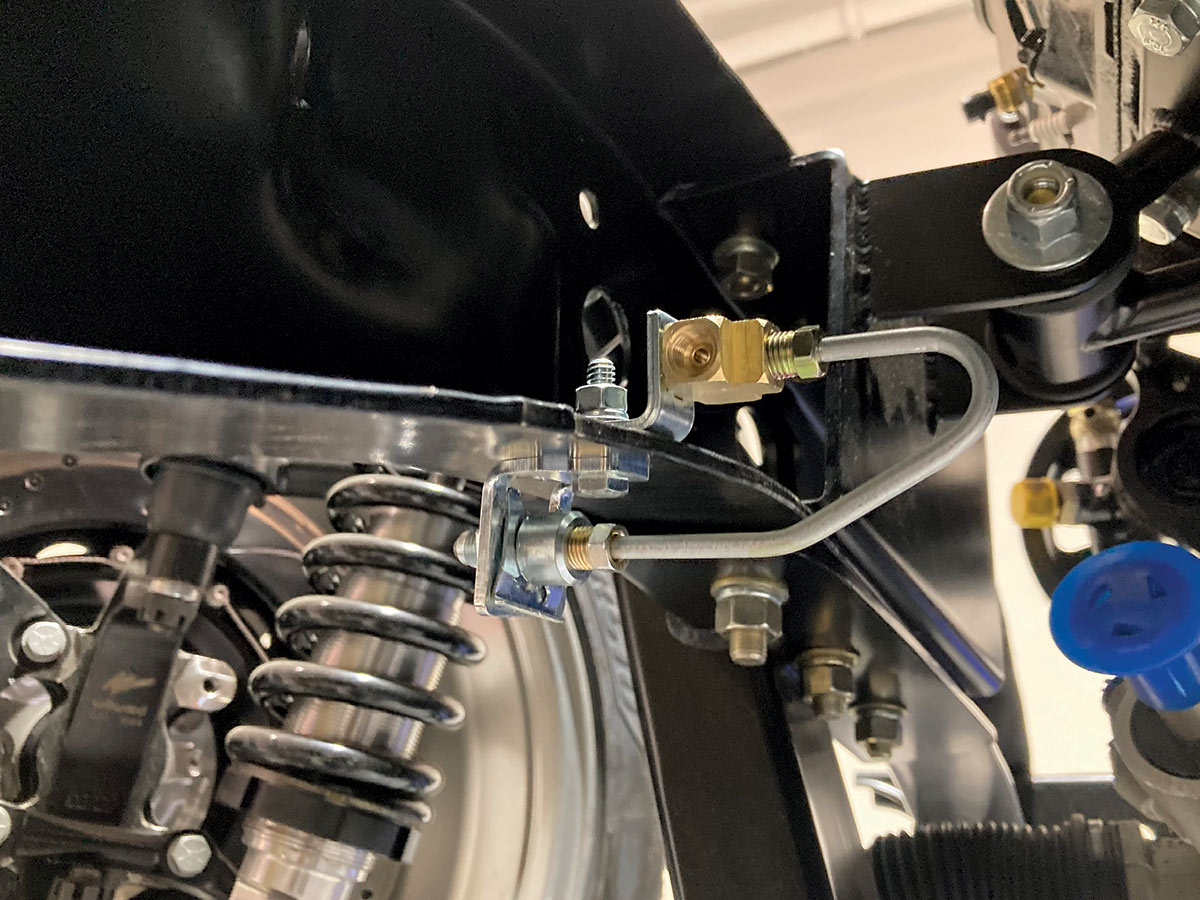 single brake line will run from the master cylinder to another Tee fitting, where it will then split between the left and the right side of the chassis