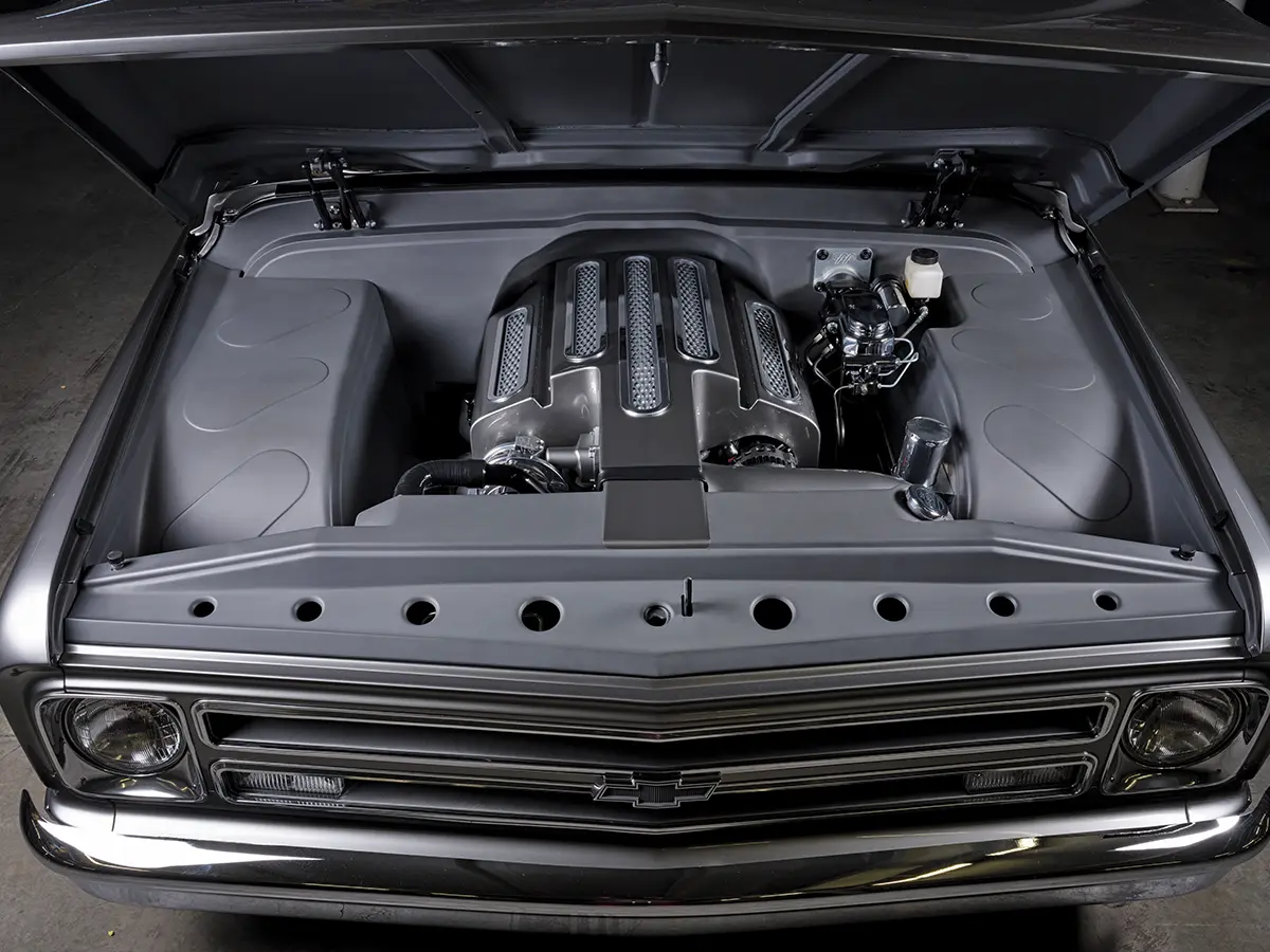 wide view under the open hood of the ’68 Chevy C10