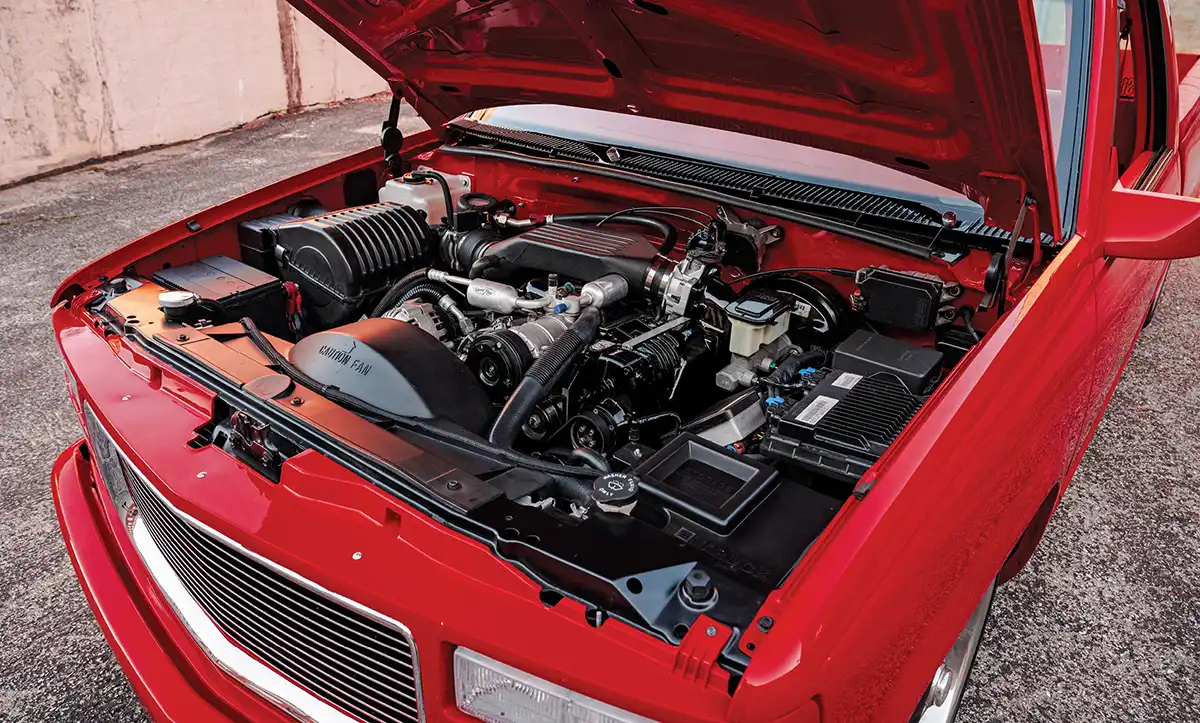 engine view of cherry red '98 Chevy