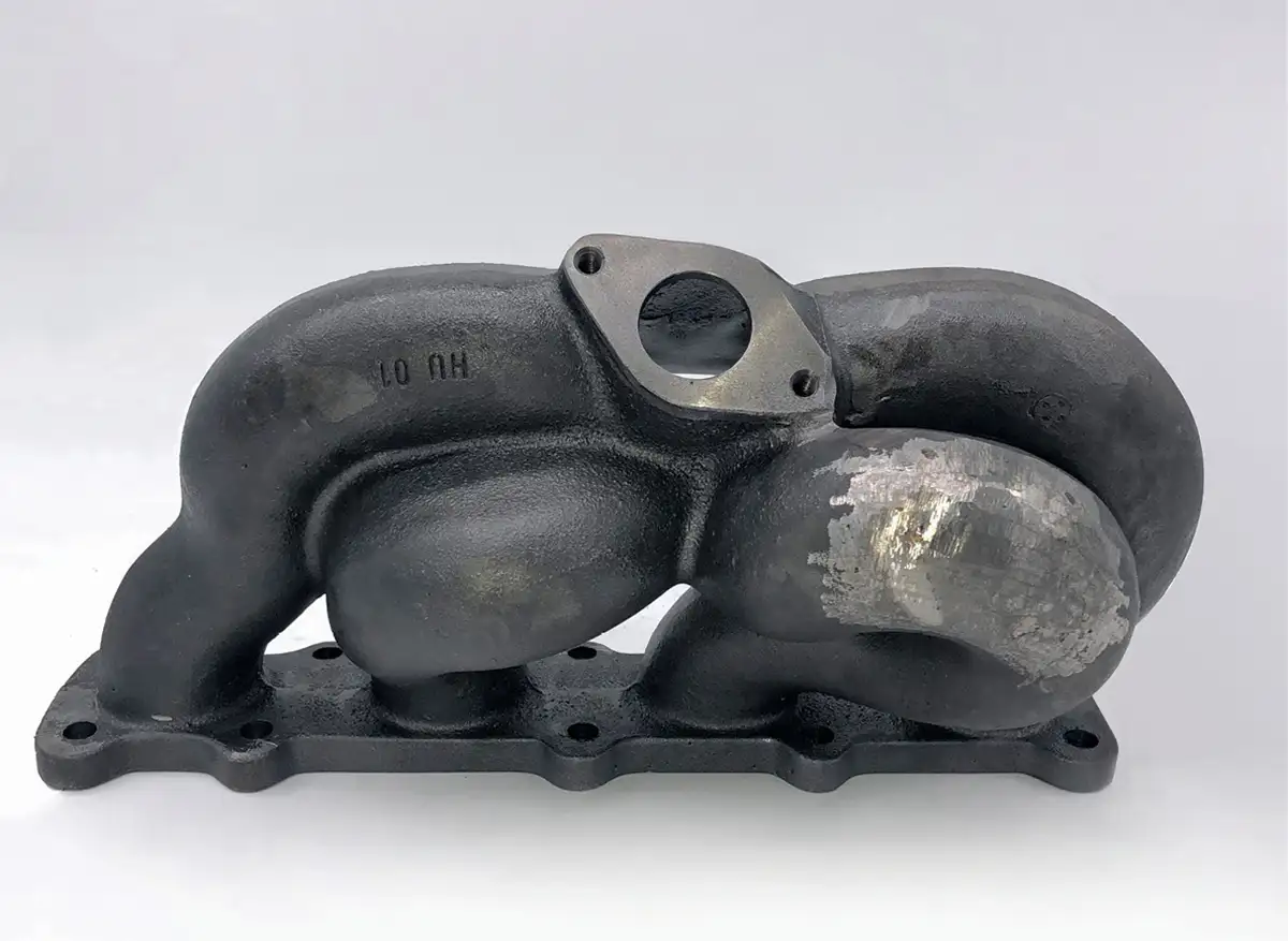 ZyBar is ideal for rough cast surfaces, too. This manifold has been welded to repair some damage.