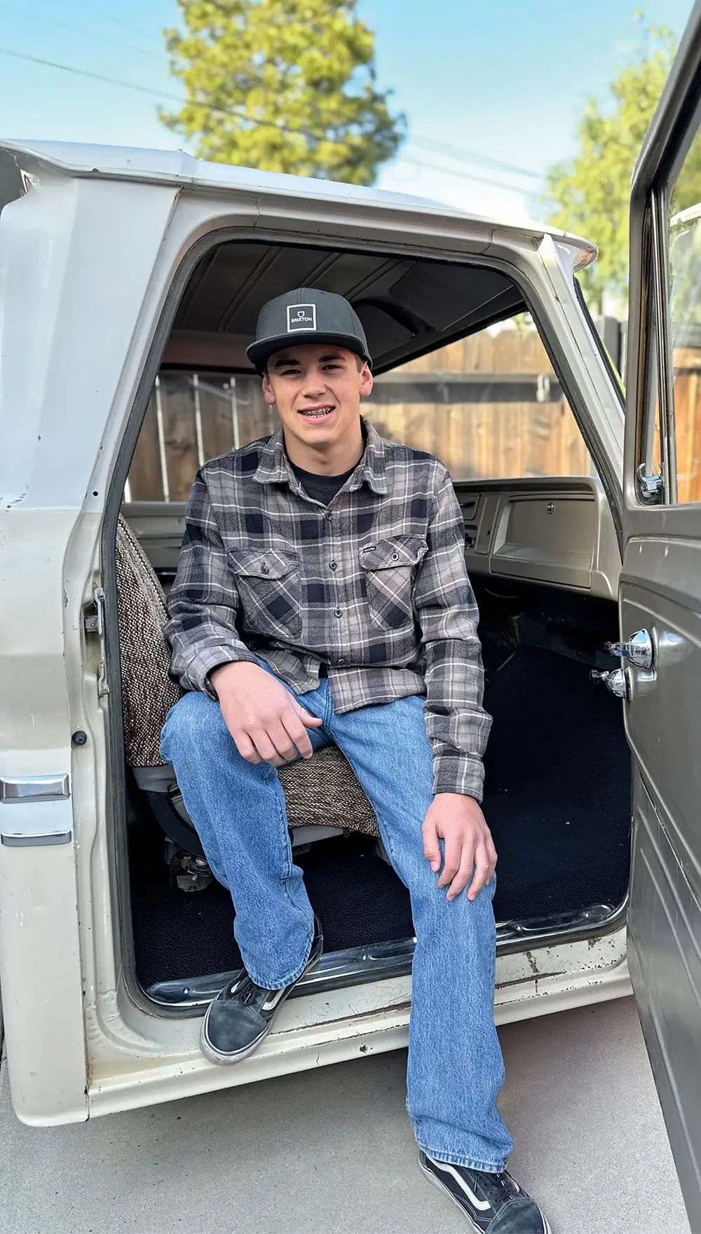 Ryan Reed sitting in a truck passenger seat