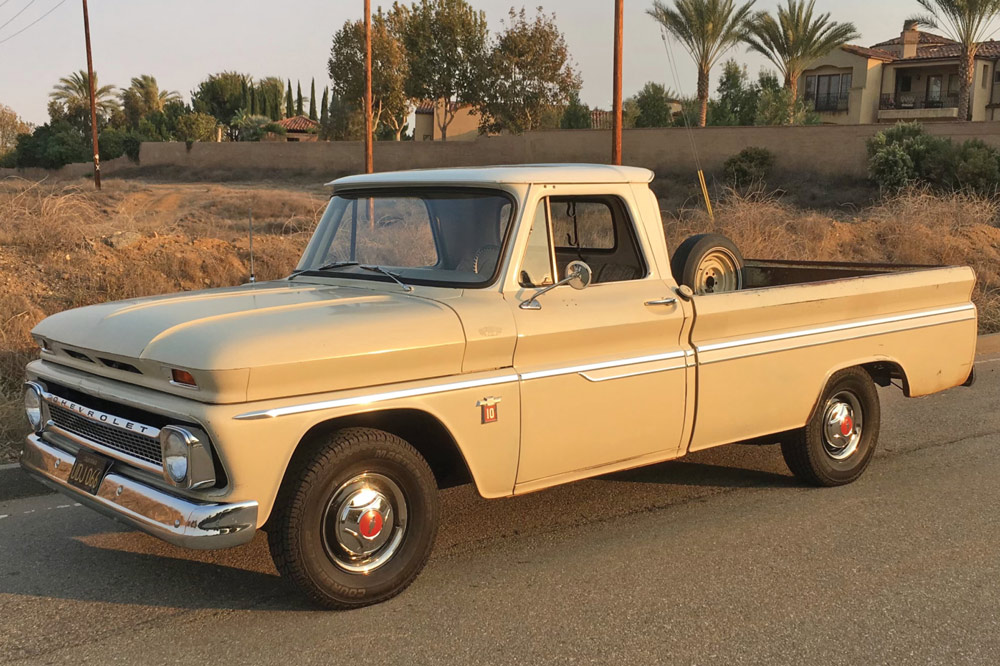 drivers side of a tan ’64 Chevy