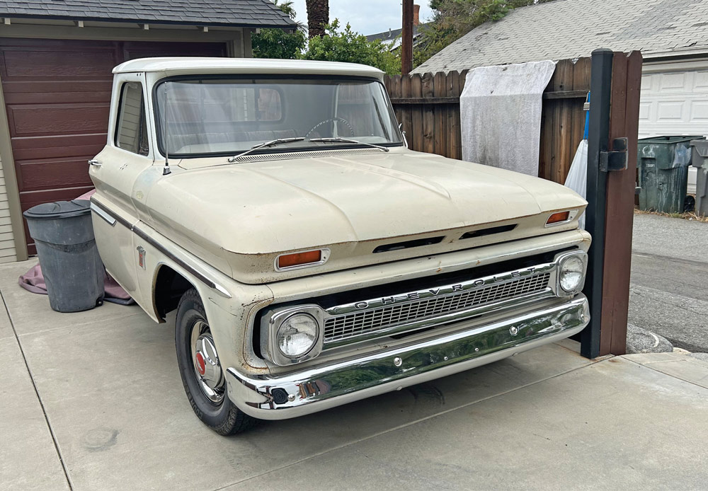 tan ’64 Chevy with the bed detached