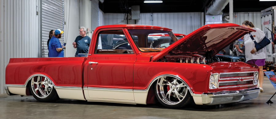 red truck with lower body cream stripe