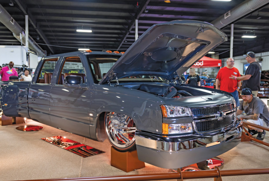 blue grey truck with hood open