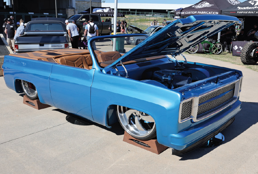 blue convertible with hood open