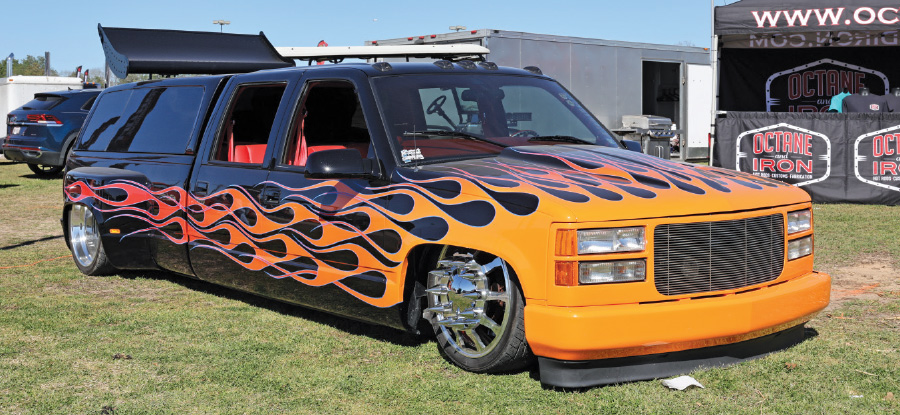 black low rise truck with orange flames