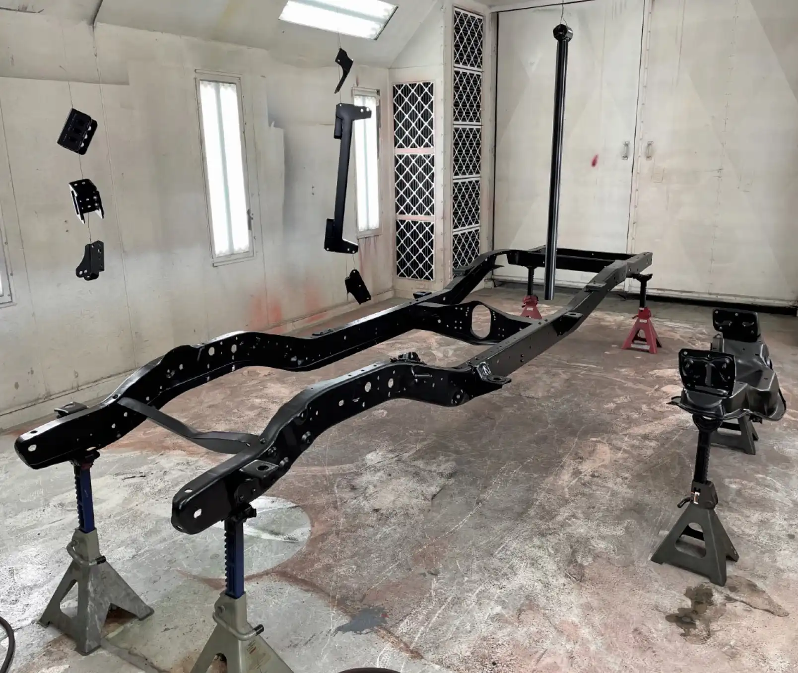 With the fabwork done, we went to the paint booth. Everything was coated with an epoxy primer followed by a single-stage urethane in semigloss black.