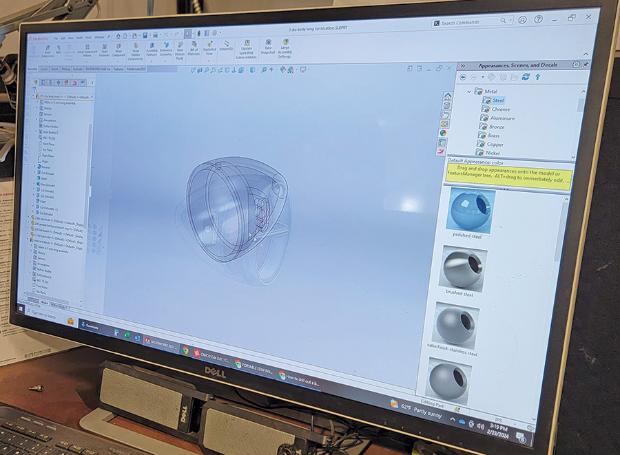 computer screen with a 3D model of the taillight housing