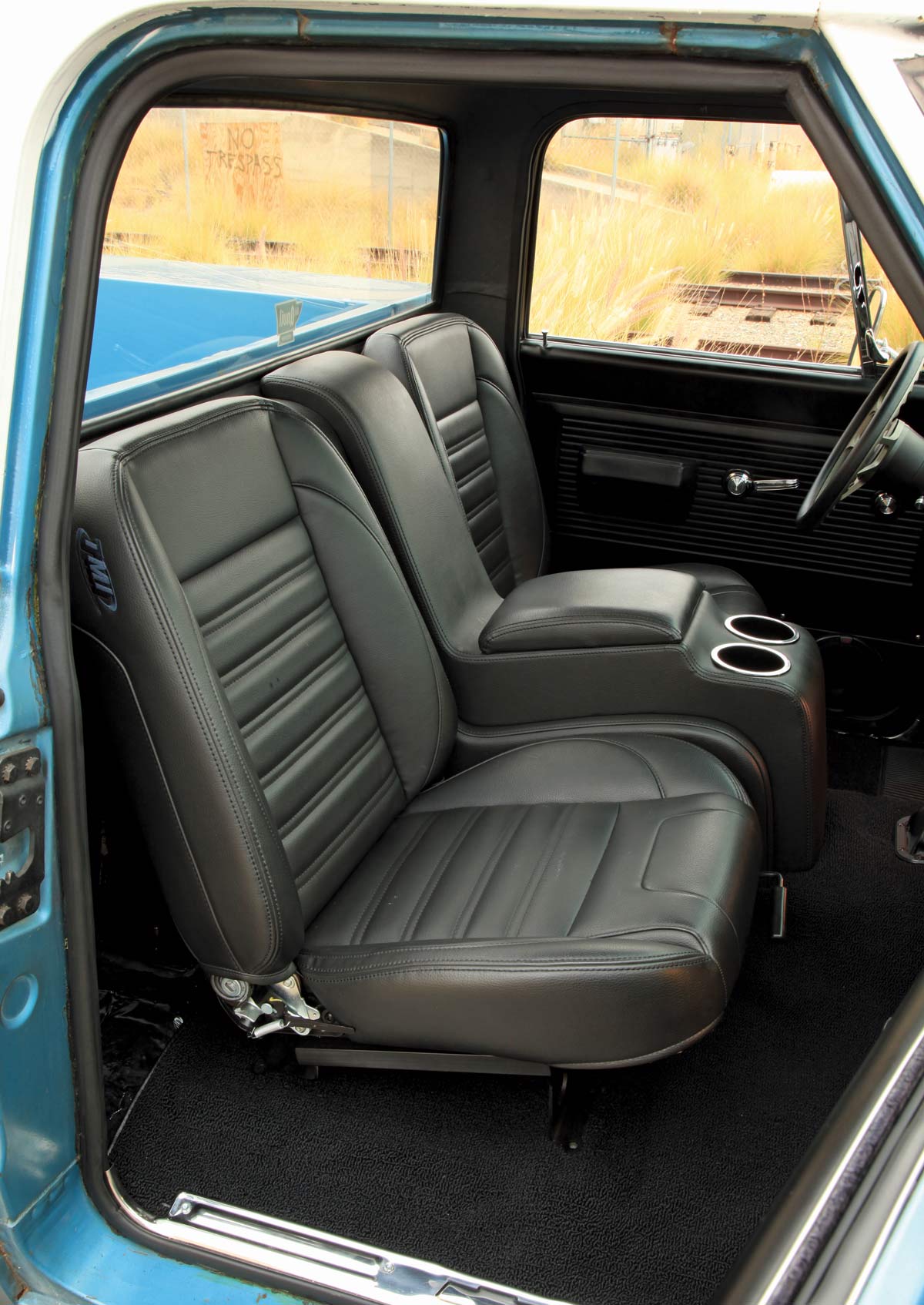 full view of black front seats in ’68 Chevy Utility truck
