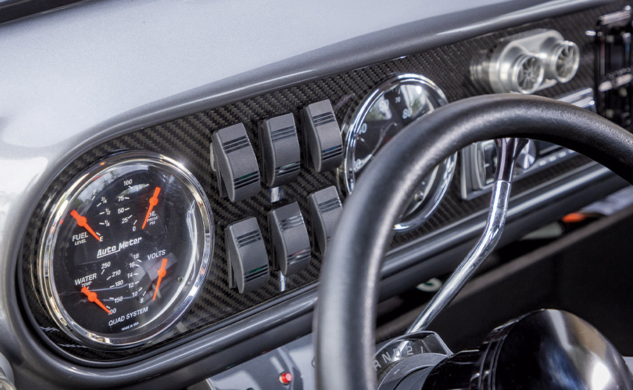 closeup of steering wheel and dashboard of '51 Ford