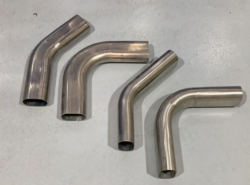 four oval pipe elbows with different degree bends