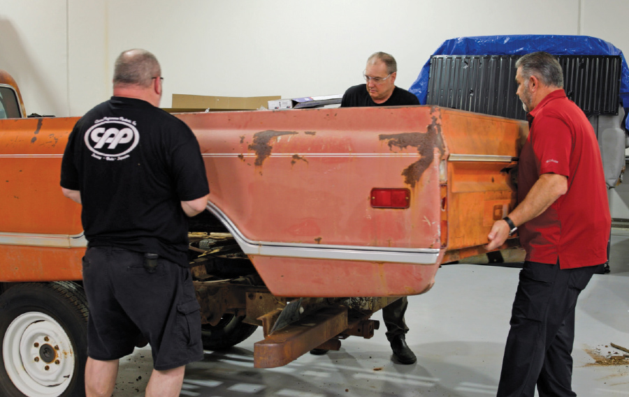 the original bed and bumper being removed