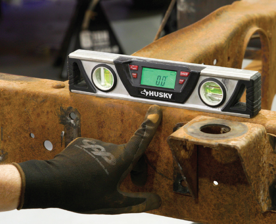 the relocated rear cab mounted to the rear portion of the frame