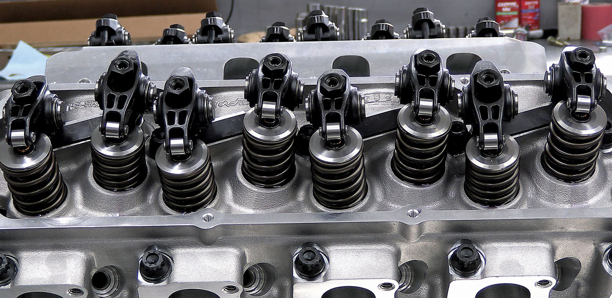 Fully assembled high-performance cylinder head featuring Trick Flow rocker arms and valve springs
