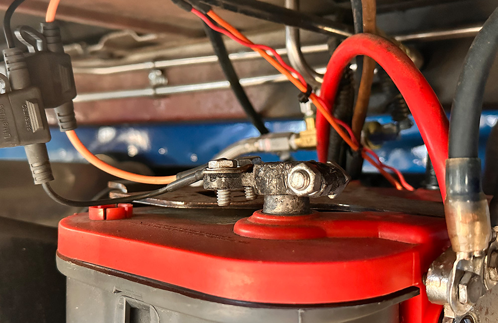 Close-up of battery connections and wiring for a 1990s Chevrolet CK 1500