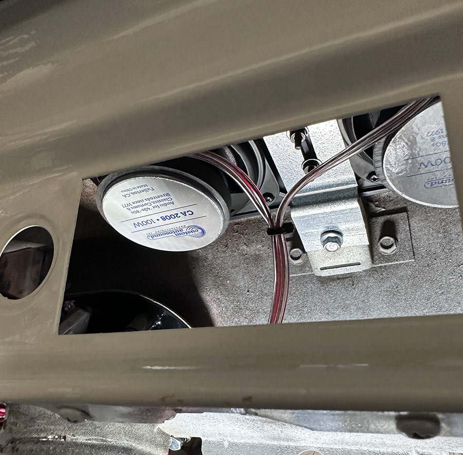 Like the original bracket, the new one is slotted to allow for adjustment