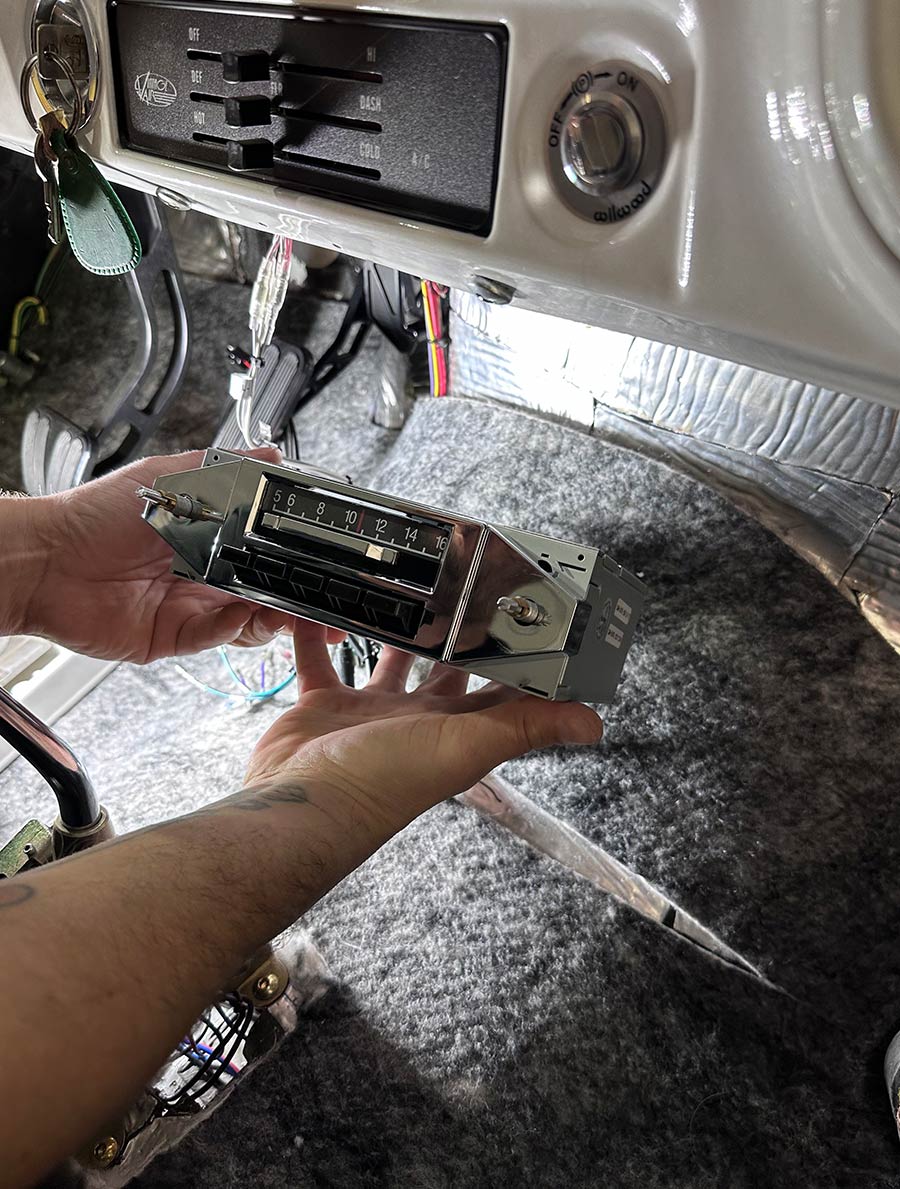 connecting the supplied harness and connecting the speaker leads first