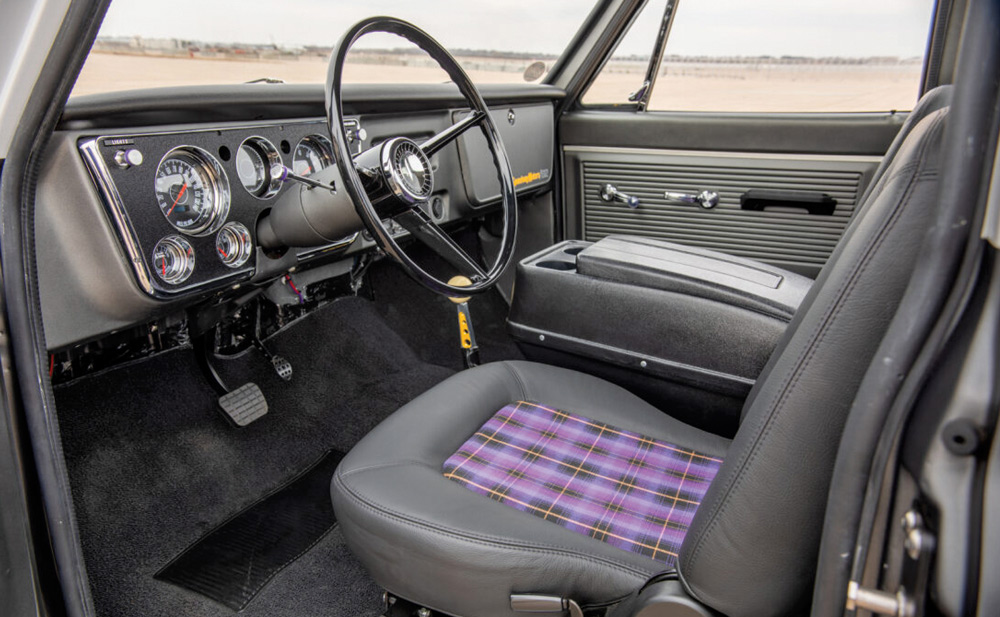 Interior of the 1968 Chevrolet C10, with classic details and a modern plaid-patterned seat insert