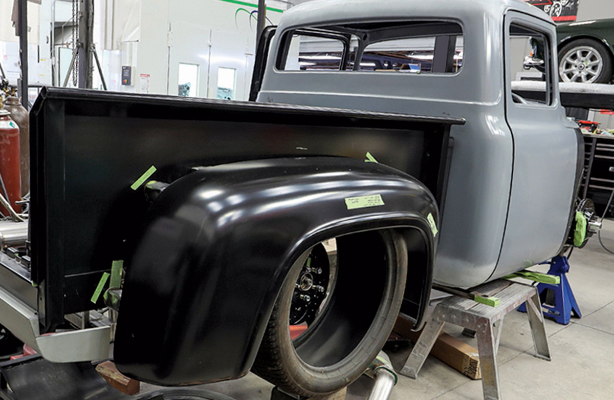 A 1953-1956 Ford F-100 undergoing a custom wide-body bed modification