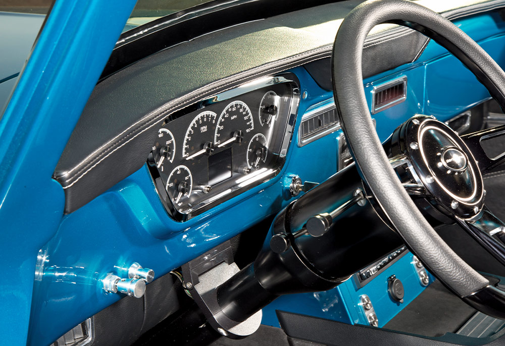 Steering wheel close-up highlighting the modern instruments and custom interior finishes