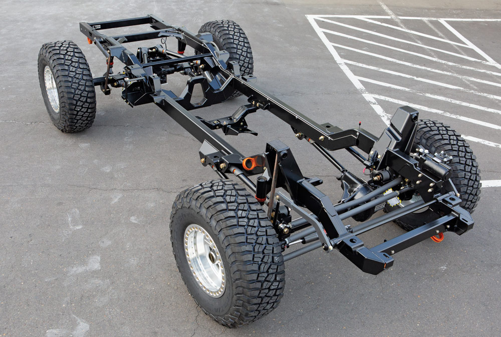 Chevy K10 rolling chassis with lifted suspension and off-road tires, ready for a body install