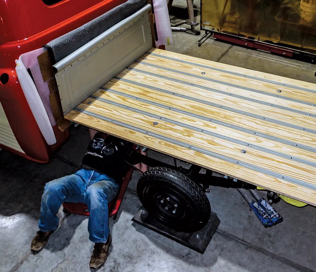 Assembling the truck bed underside, ensuring all boards are secure