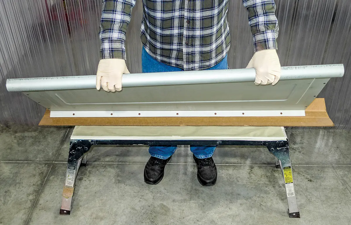 Preparing truck bed support rail for installation