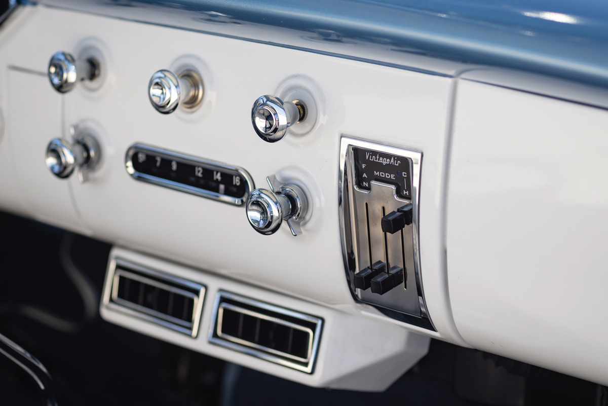 1955 Chevy dashboard with Vintage Air controls, chrome knobs, and retro styling