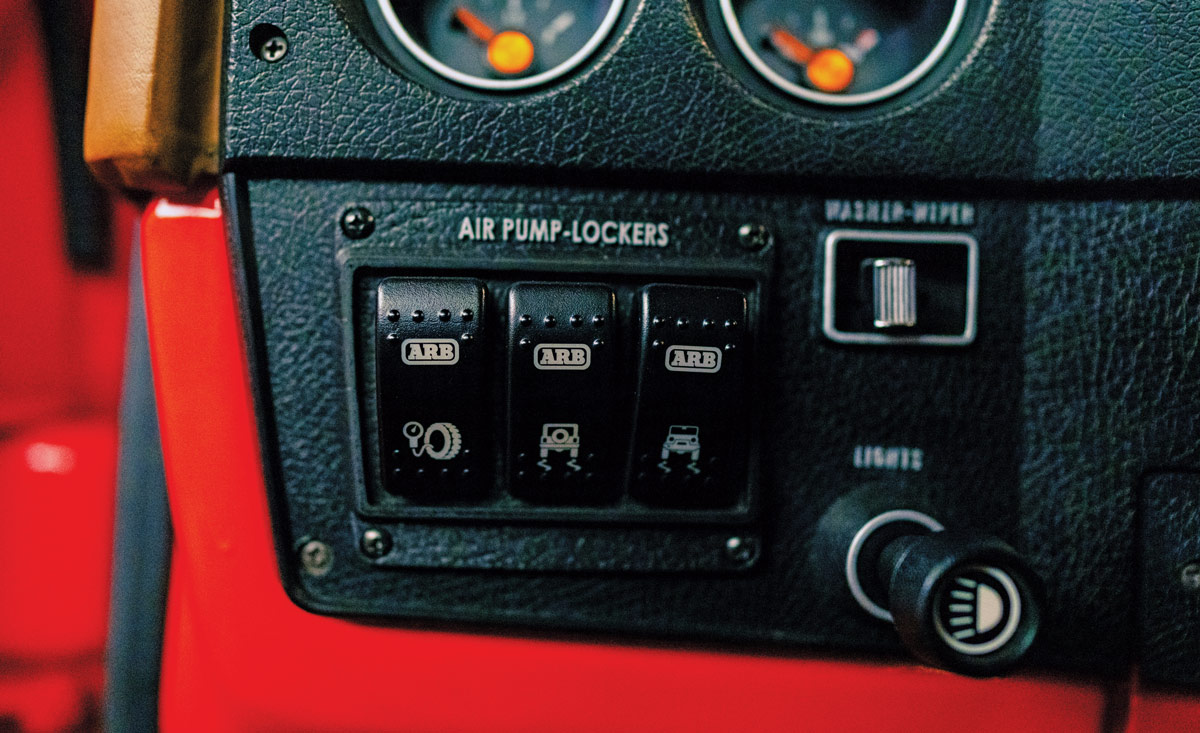 Interior view showing ARB air locker switches installed in the 1979 GMC K2500’s dashboard for enhanced off-road control