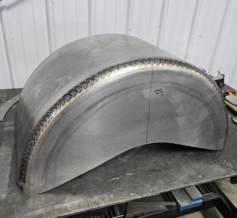 Wilwood brakes and reinforced fender installation in Chevy OBS truck bed