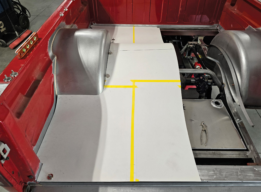 Test-fit of custom sheet metal bed floor panels in Chevy OBS truck