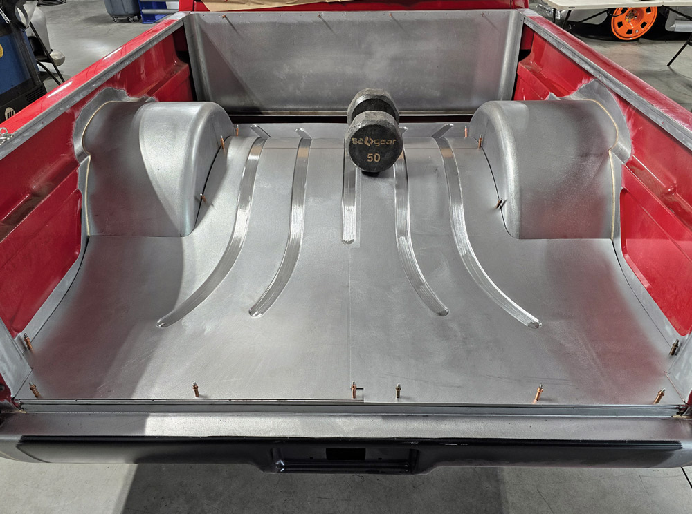 Fabricated lower bed sides with formed metal work for Chevy OBS truck restoration