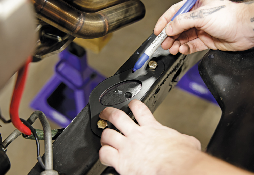 Marking frame rail for IFS component placement during Chevy C10 custom suspension installation