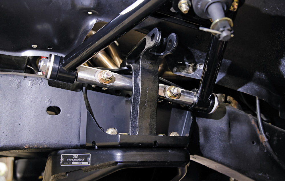 Upper and lower A-arms installed on Chevy C10, showing clean integration with crossmember and spindles