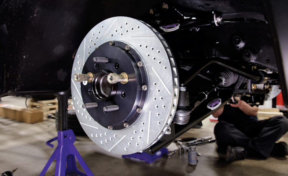 Drilled and slotted brake rotor installed on the DSE Chevy C10 front suspension for optimal stopping power