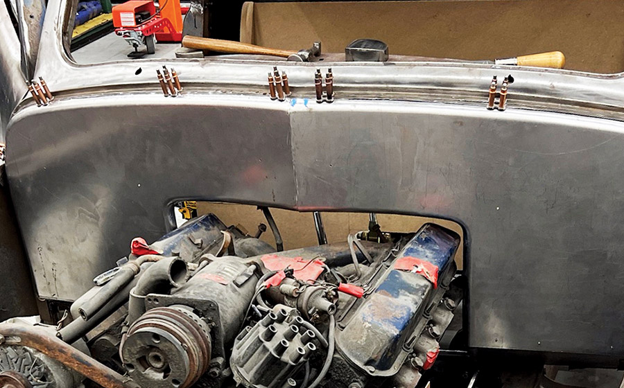 Custom firewall installation steel sheet cleco pins vintage car engine bay fabrication project