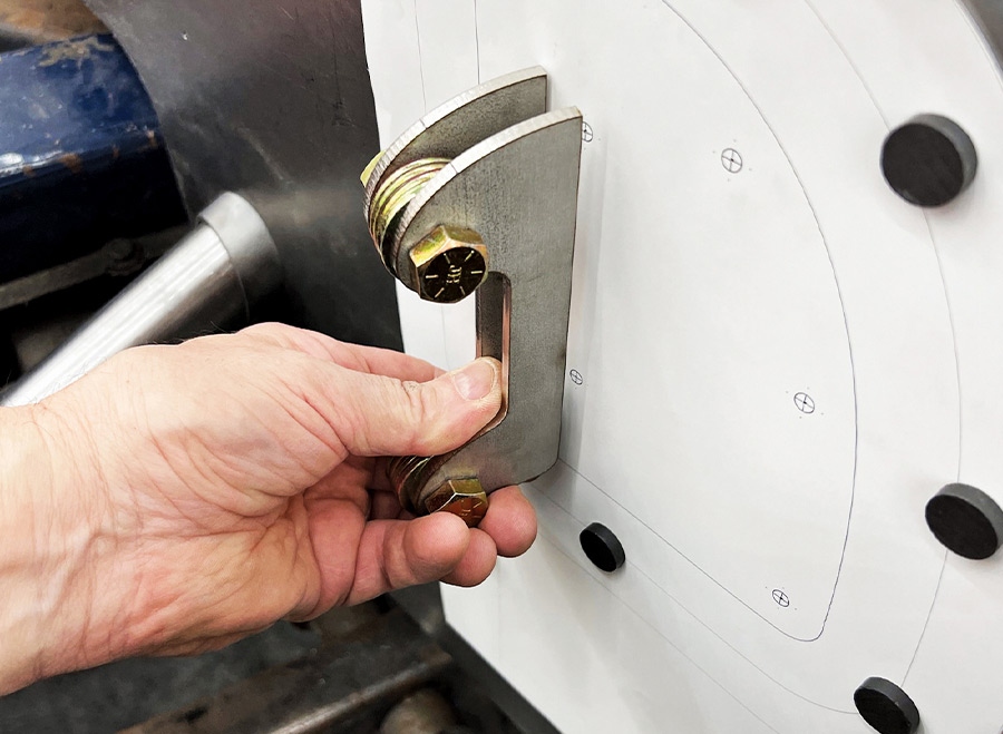 Hand adjusting custom steel bracket firewall template vintage car fabrication assembly process