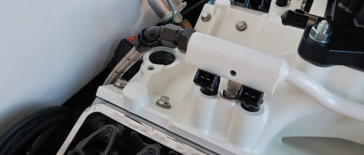 Close-up of the FiTech fuel rail connections highlighting clean and secure fittings