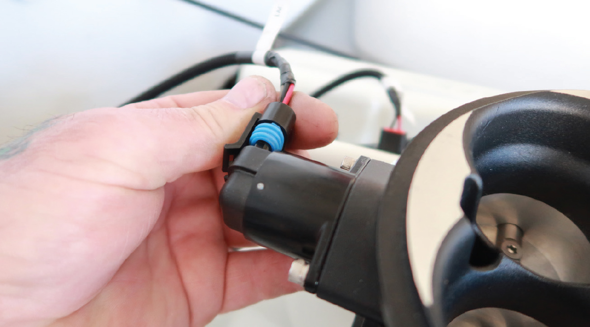 Injector wiring harness being connected to the FiTech system for seamless fuel delivery