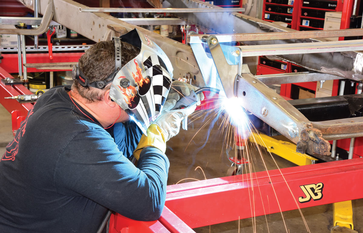 Welding front suspension brackets on 1946 Chevy truck frame
