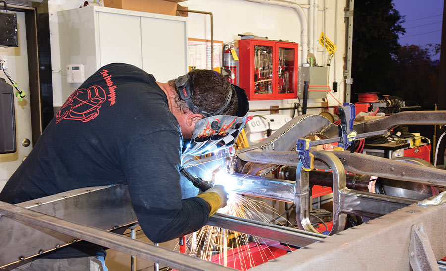 Welding rear suspension brackets on 1946 Chevy truck frame