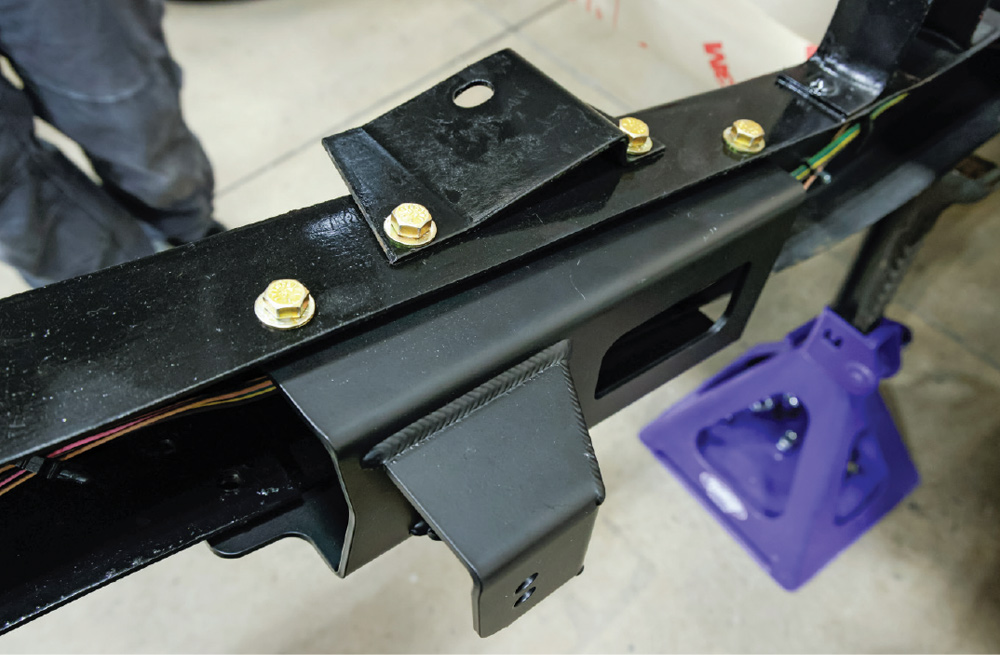 bolted Detroit Speed frame notch on C10 truck chassis clean professional installation result
