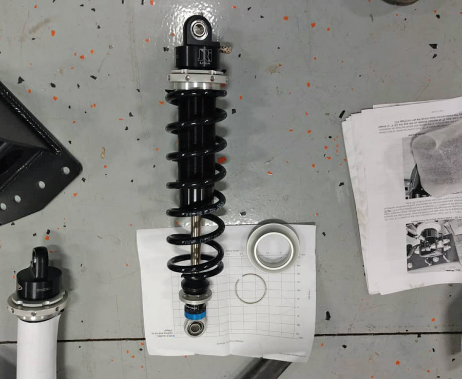 completed Quadralink suspension with coilovers and disc brakes installed on C10 truck frame