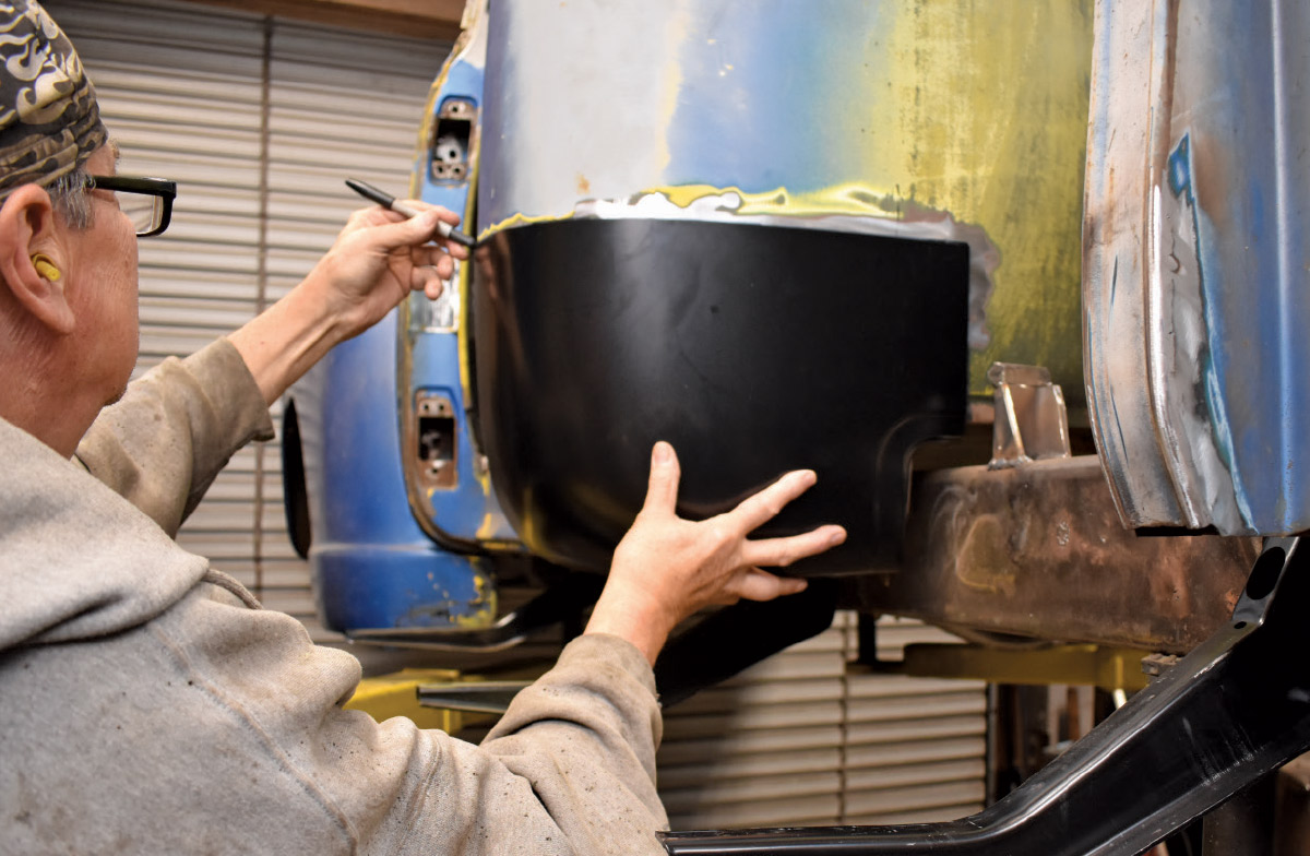Test fitting the new cab corner panel before welding