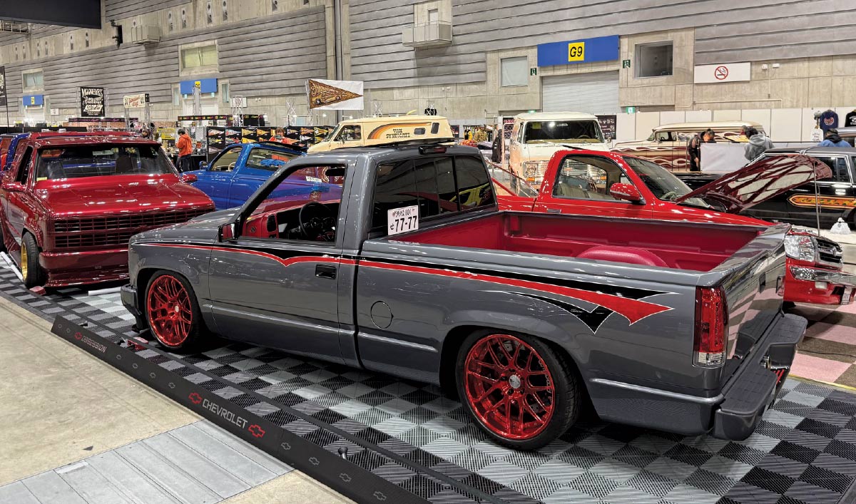 1988-1998 Chevy CK – Gray with red pinstripes, lowered, and sitting on red multi-piece wheels